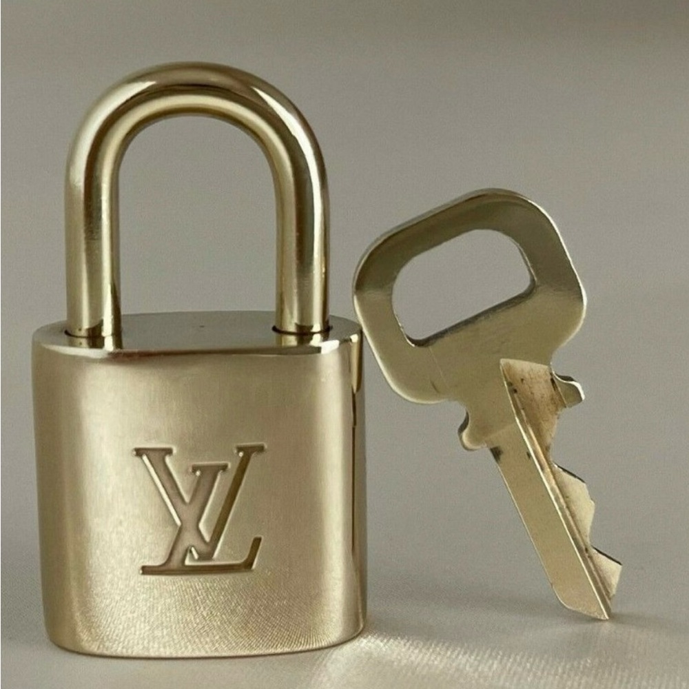 Authentic!!! Louis Vuitton Lock and Key Set! 301, 309, 330